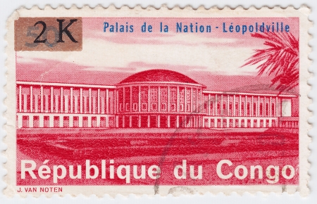 CONGO - CIRCA 1977 : stamp printed in Congo shows Palace of The Nation in Leopoldville city, circa 1977のeditorial素材