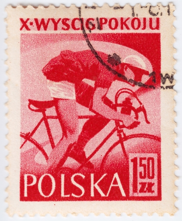 POLAND - CIRCA 1957 : post stamp printed in Poland shows bicyclist, circa 1957のeditorial素材