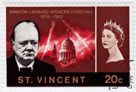 ST. VINCENT - CIRCA 1990 : Stamp printed in St. Vincent shows Winston Churchill (L) great prime minister in UK and queen Elizabeth, circa 1990のeditorial素材