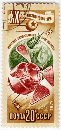 USSR - CIRCA 1971 : Stamp printed in USSR (now is Russia) shows the soviet 20 anniversary of explorations space, circa 1971のeditorial素材