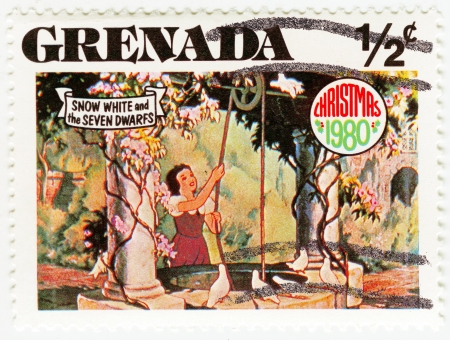 GRENADA - CIRCA 1980 : stamp printed in Grenada shows Snow White and The Seven Dwarfs cartoon at Christmas, circa 1980のeditorial素材