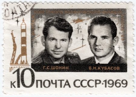 USSR - CIRCA 1969 : stamp printed in USSR show cosmonauts Shonin (L) and Kubasov , circa 1969 のeditorial素材