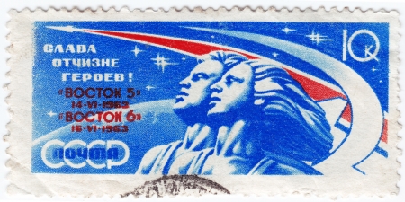USSR - CIRCA 1963   stamp printed in USSR shows the soviet exploration with Vostok space stations, circa 1963のeditorial素材