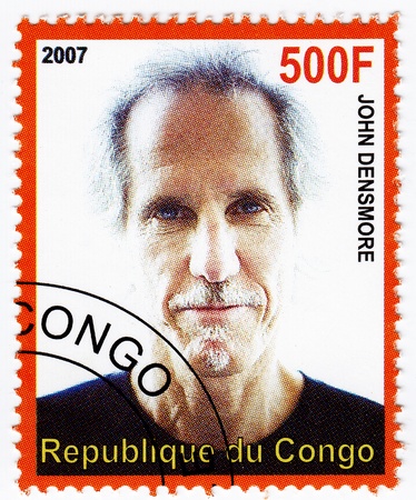 CONGO - CIRCA 2007   stamp printed in Congo with John Densmore guitarist from music group Rolling Stones, circa 2007のeditorial素材