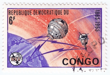 CONGO - CIRCA 1965 : Stamp printed in Congo shows Explorations of space, circa 1965のeditorial素材