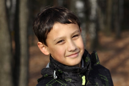 boy relaxing in autumn