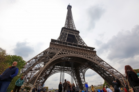 PARIS - APRIL 27 Locals and tourists at Eiffel tower, stands 324 metres  1,063 ft  tall  Monument was built in 1889, attendance is over 7 millions people in year  View on April 27, 2013 in Parisのeditorial素材