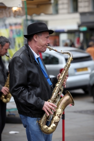 PARIS - APRIL 27  Unidentified musician play before public outdoors on April 27, 2013 in Paris, France  Everyday more 100 buskers perform on the streets and in the metro of Parisのeditorial素材