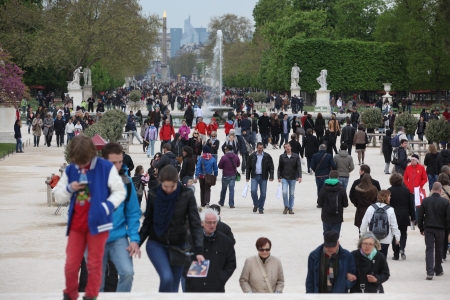 PARIS - APRIL 24: Local and Tourist in the famous Tuileries garden on April 24, 2012 in Paris. Tuileries Garden is a public garden located between the Louvre Museum and the Place de la Concorde and very popular sitte のeditorial素材