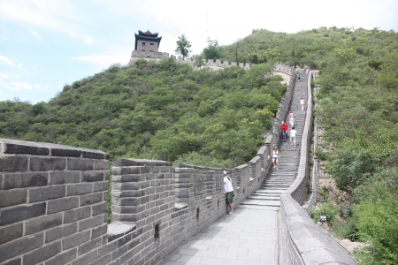 BEIJING - JUNE 12: Visitors walks on the Great Wall of China on June 12 2012. Four million people visits the great wall each year. The Great Wall of China is the longest man-made structure in the worldのeditorial素材