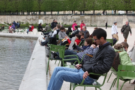 Local and Tourist in the famous Tuileries garden in Paris  Tuileries Garden is a public garden located between the Louvre Museum and the Place de la Concorde and very popular sitte のeditorial素材
