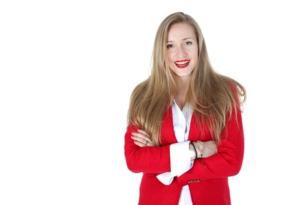 Casual woman in red coat smiling isolated の写真素材