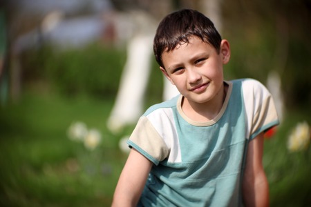 little boy against summer background