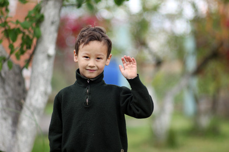 smiling happy boy outdoorsの写真素材