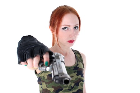 Young beautiful Woman holding Handgunの写真素材