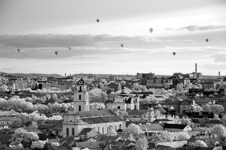 The main view of Vilnius Old town from its hills with air balloons, Lithuaniaの写真素材