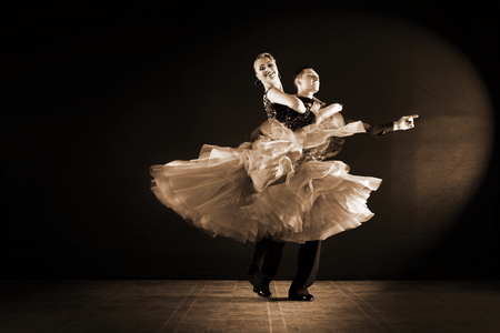 Dancers in ballroom isolated on black backgroundの写真素材