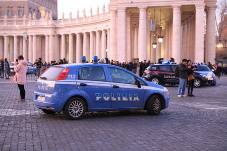 VATICAN - DEC 28: Vatican police control the street in Vatican the 28 Decenber 2018, Italy. Vatican is one of the most populated metropolitan areas in Europeのeditorial素材