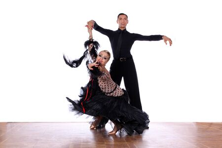 Dancers in ballroom against white backgroundの写真素材