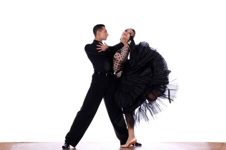 dancers in ballroom against white backgroundの写真素材
