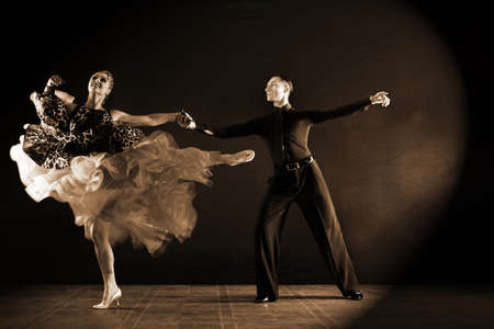 Dancers in ballroom isolated on black backgroundの写真素材