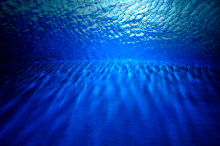 Deep blue water background of the swimming poolの写真素材