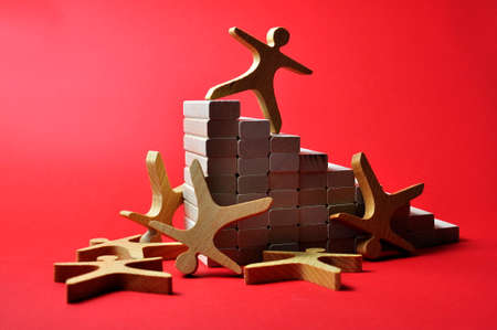 A person at the top of the career ladder. The concept of achieving success.