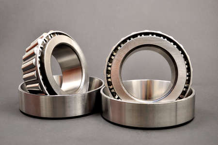 Roller bearings on a dark background. Spare partsの写真素材