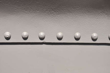Steel riveted surface. Background image.