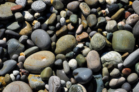 Sea pebbles close-up. Background image.