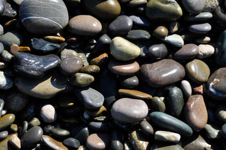 Sea pebbles close-up. Background image.