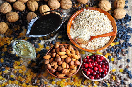 Ingredients for Granola. Muesli with nuts, raisins and cranberries ..の写真素材