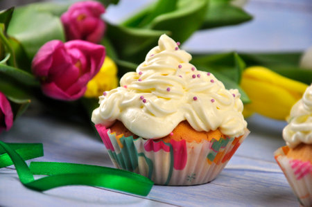 Birthday cupcake with colorful sugar sprinkles.