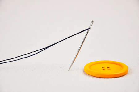 Needle and thread for sewing clothes. blurring.の写真素材