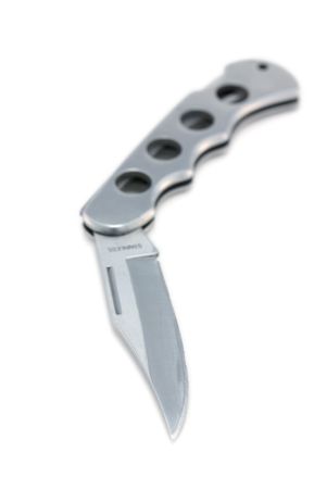 Full metall knife isolated on white, shallow depth field.の写真素材