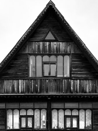 Old wooden house in black and white. Black and white photo.の写真素材
