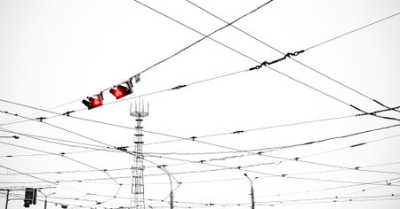 Telecommunication tower with red signal lights and wiresの写真素材