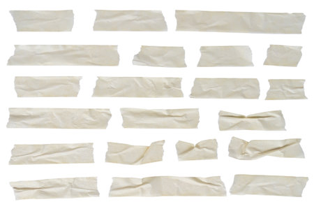 Assorted strips and pieces of masking adhesive tape isolated on a clear background. Design elements.の写真素材