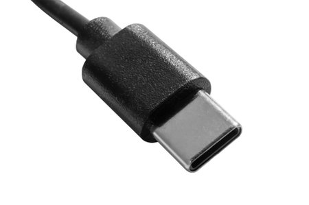 Close up of usb type c connector, showing its reversible design and compatibility with modern electronics. Isolatedの写真素材