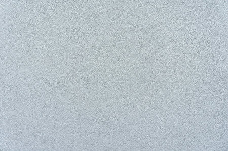 Captivating close-up of a wall adorned with elegant gray decorative stucco, adding a touch of sophistication to any space.の写真素材