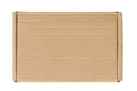 A plain brown rectangular cardboard box with flaps is ready for shipping or storage, isolated on a white background for versatile design applications.の写真素材