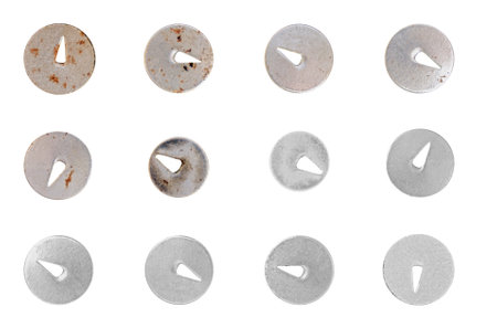 Thumbtacks collection are displayed, some showing signs of rust and wear, highlighting the effects of time and usage. Isolatedの写真素材