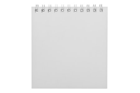 White page of a spiral notepad isolated on white background, ready for creative ideas and texts.の写真素材
