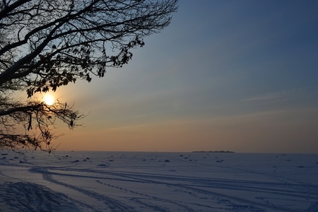 Frozen Gulf of Finland at sunset, Russiaの写真素材