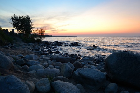 The photo of summer sunset on lake Ladoga