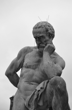 Statue on the streets of Paris, France. Black and white.のeditorial素材