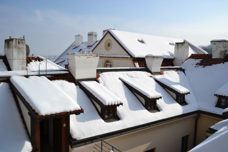 Roofs of Prague at winter. View from the grounds of Prague Castle (PraÅ¾skÃ½ hrad) Czech Republic.の写真素材
