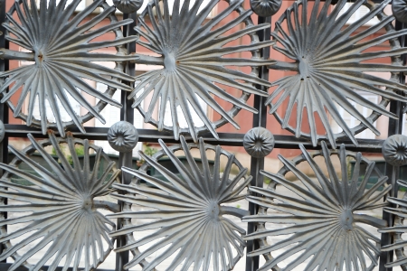 Metal fence designed by Anton Gaudi in Park Guell in Barcelona, Catalonia, Spain.の写真素材