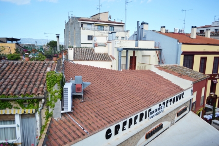 Figueras, Spain - June 24, 2013: Roofs of the Catalan town of Figueres, Spain.のeditorial素材