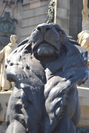 Statue of a lion, fragment of Columbus Column in Barcelona, Spain.の写真素材